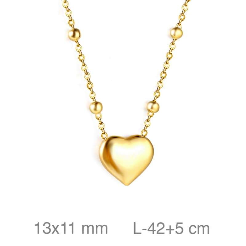 Collar con Bolitas y Corazón en Acero Dorado